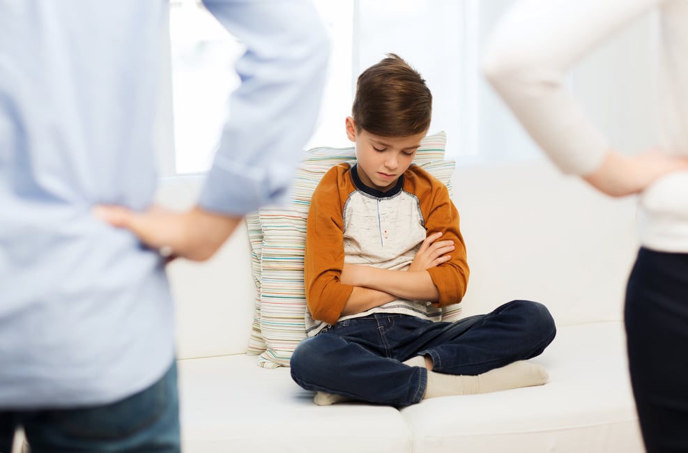 Upset or Feeling Guilty Boy and Parents at Home